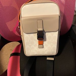 Coach crossbody never used just sitting in the closet.